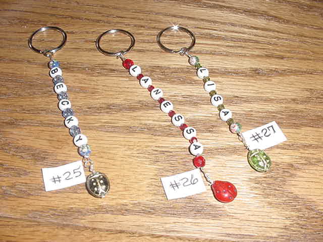 Keyrings with ruby red or green czech beads.  They have czech ladybug beads in blue, green or red ladybugs.  They are $6.00 each.