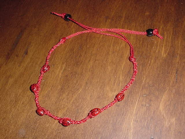 Product#28 is a anklet ladybug tie red thread bracelet. It sells for $12.95.  The anklet can be made in any size needed. 