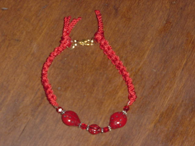 red thread family ladybug bracelet.jpg